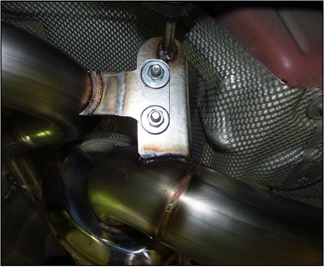 0 Accu-Seal clamps to attach factory mid pipe to the muffler inlet. For proper clamping, make sure this coupler equally overlaps the mid pipe outlet and the muffler inlet.