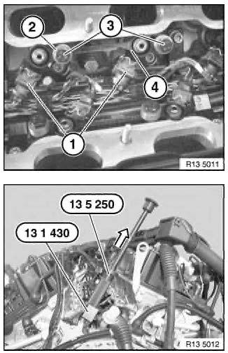 VANOS Oil Ports 42-02-40 Fuel Injector Removal The fuel injector installed position and mounting pressure are maintained by a twin hold down fixture (one hold down fixture for every two fuel
