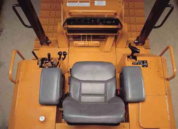 Comfort and control is what crawler producti ity is all about, and the 650 and 50 are right on target, from the location and smooth operation of the controls to the adjustable seat and armrests that