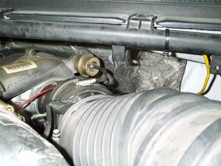 resulting in a cooler running engine. For installation of the boost tube, locate the red air line connected to the waste gate of the turbo.