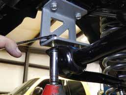 Mount the supplied sway bar drop brackets to the frame with the original