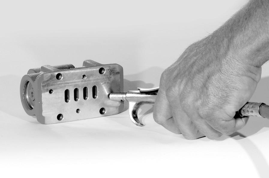 The bushing in the center block, along with the diaphragm, shaft, provides the trigger to tell the air valve to shift.