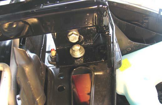 Do this to both sides. Fully tighten the hardware. Using a 13/32 drill bit, drill the holes above thru the bumper (gray).