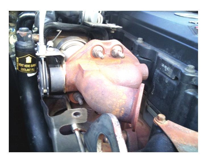 Step 9: Remove the four bolts that mount the exhaust bypass valve