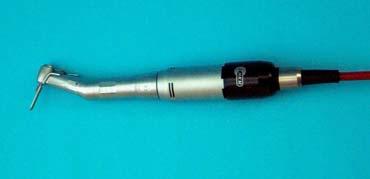 To unlock, the conta angle handpiece is pulled off from the micromotor.