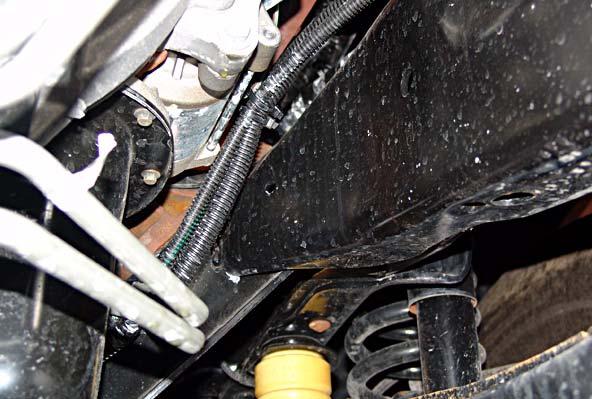 () Engine oil pan () Engine cradle (3) Heater control and fuel pump harnesses 3 Fig.