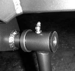 The balljoint must point up. Place the 3/4 ID end caps on the inside bushing and slide the arm into place on the pivot tubes on the frame.