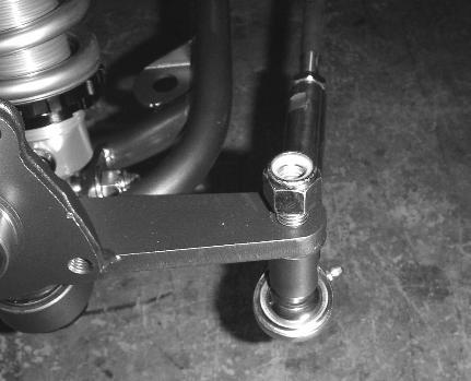 Slide one U-joint onto the steering input shaft and center the rack in its travel by hand.