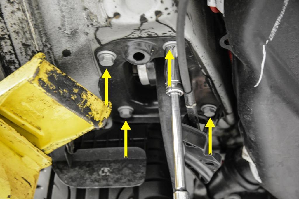 Step 10 Locate the 4 bolts securing the front of the trailing arm to the