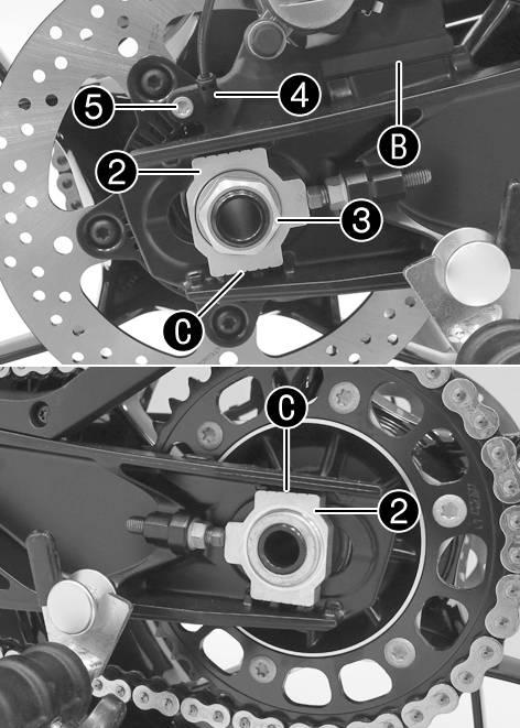 15 WHEELS, TIRES Engage the thurst bearing of brake caliper supportband the swingarm. Lift the rear wheel into the swingarm, position it, and insert the wheel spindle.