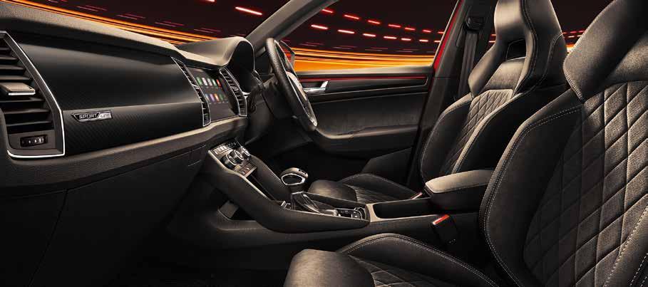 STYLISH FUNCTIONALITY Black Suedia and leather sport seatsº with silver stitching give the interior a race-like feel.