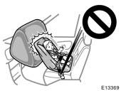 Never put rear- facing child restraint system on the front seat because the force of the rapid inflation of