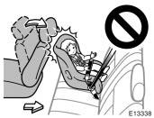 Move seat fully back Never put a rear- facing child restraint system on the front seat because the force of the rapid inflation of the passenger airbag can cause death or serious injury to the child.