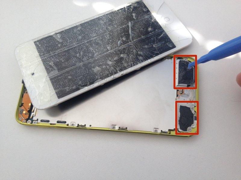 The bottom of the screen (near the home button) is held in place with strong adhesive.