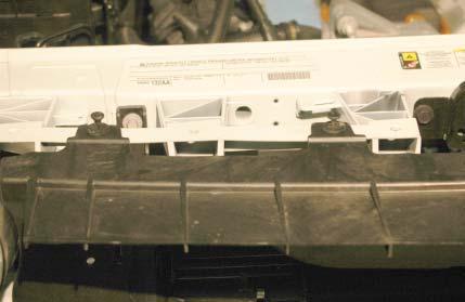 21. The remaining eight clips holding the plastic bumper section