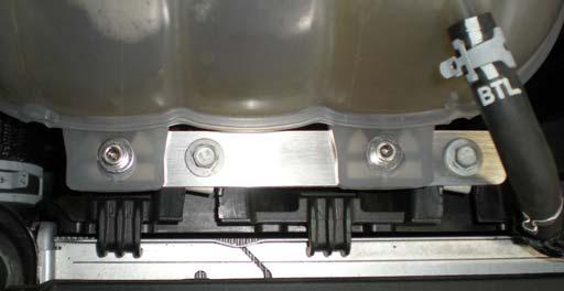 6. Install the PMAS heat shield in the stock air cleaner housing location.