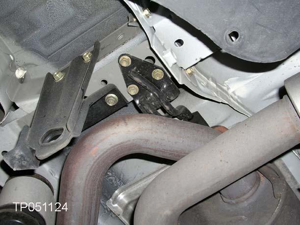13. Remove the rear muffler bracket bolts (see Figure 47a and 47b).