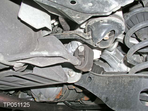 the driver s side rubber muffler hanger off of the muffler hanger pin 14.
