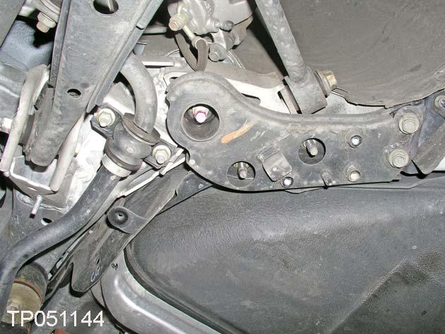30. Remove the bolts and nuts that hold the suspension member stay brackets (both passenger and driver s side