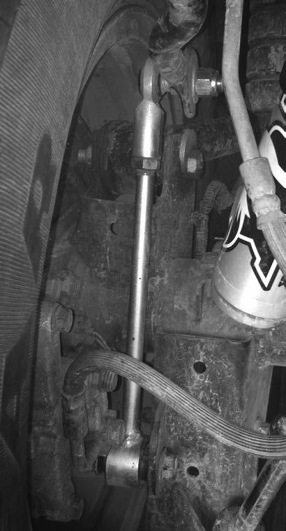 The supplied Adel clamps (one per side) hold the re-formed metal brake lines snuggly against the frame to prevent them from potentially making contact with the sway bar links.