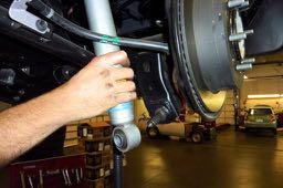 Step 40 Disconnect the sway bar from both sides of the rear axle assembly by removing the