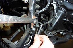 Steering Knuckle Sway Bar Link Allen Wrench Step 4 Disconnect the driver side sway bar link from the