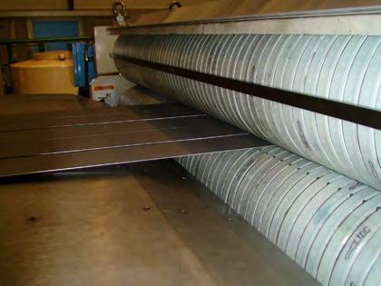 field of application of RB21 The field of application of RB21 is to rewind firm and tight coils and to provide a uniform tension for slit stripes of every kind of coil without scratching or marking