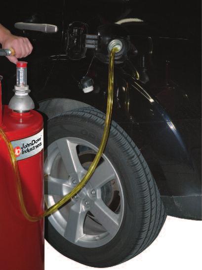 Raise the car a couple of feet off of the ground; slide a catch pan or bucket under the tank; remove the plug and let the gasoline drain back into the bucket. And make sure the bucket is clean.