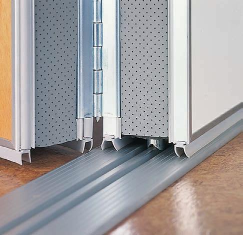 possible to retain uniform flooring under the partition without the need for a floor track.