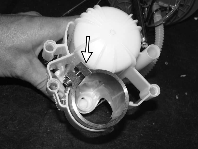 36) Rotate the APR pump spacer in the inner pump housing clockwise, until the screw for the pump spacer is almost touching the fuel filter housing.