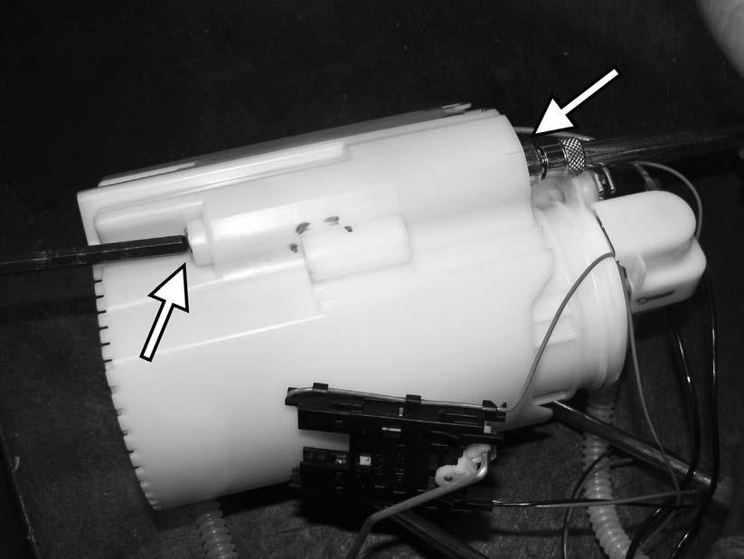 43) Use a 4mm allen socket on the head of the bolts under the pump