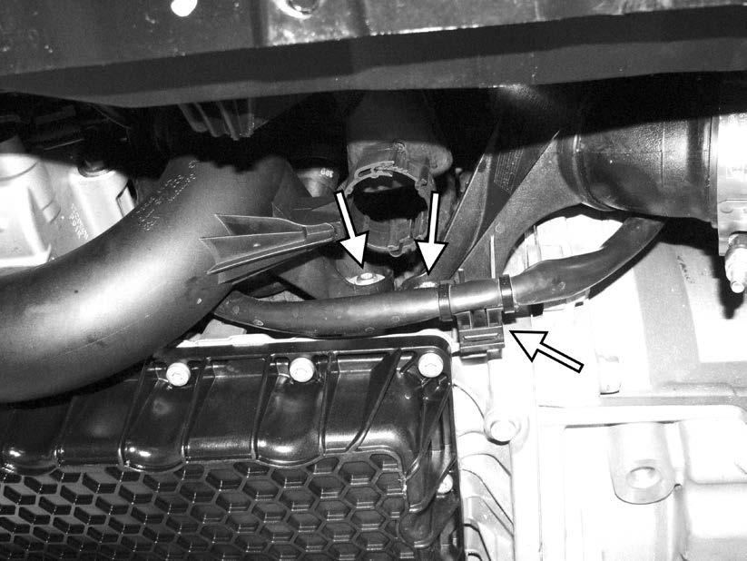 59) Remove the one T30 screw holding the throttle body inlet pipe to the engine block.