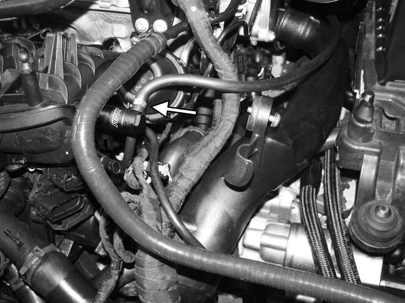 68) Carefully loosen the wiring harness from the side of the turbo outlet pipe, and then remove
