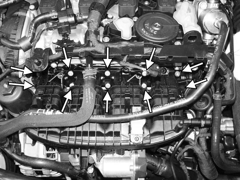89) Reinstall the eight T30 screws and two 10mm nuts holding the intake manifold to the