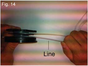 To reload the spool with line:- Cut two lengths of spare line 3 metres long.