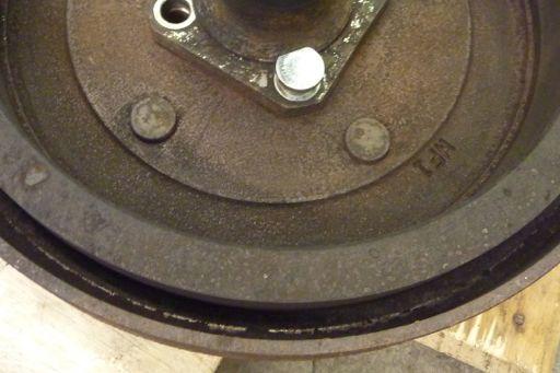 Flat Facing Center Step 50 Align the axle hub stud holes with the brake drum holes and insert