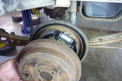 Figure N Step 105 Install the brake drum. Self adjusting ratchet at its lowest setting.