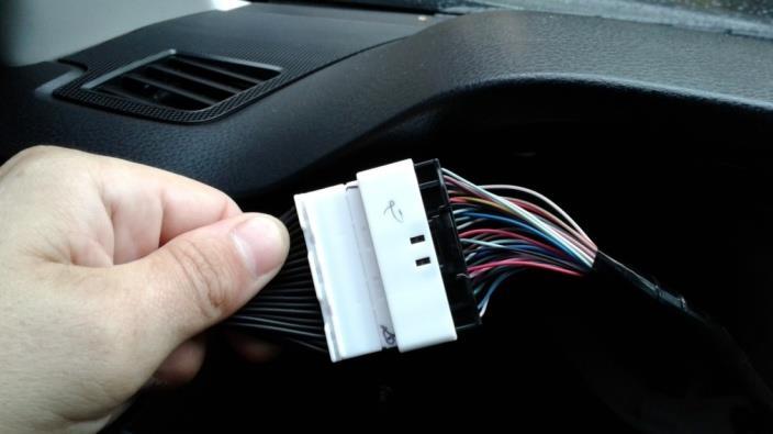 12. Connect the male end of the Speedometer Calibrator Harness to the factory wiring harness and