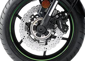TRIPLE PETAL DISC BRAKES ø310mm front petal discs gripped by opposed 4-piston calipers deliver