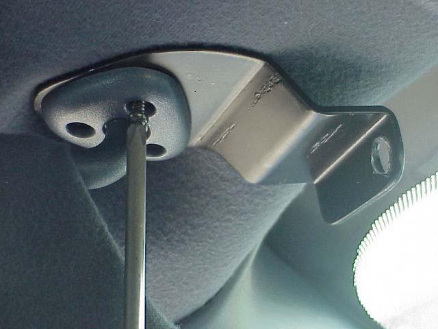Attach the driver's side bracket to the headliner with the inner torx screw as shown in figure 5.
