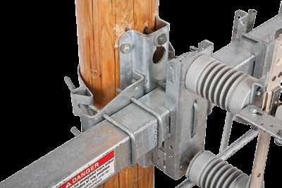 provided. For vertical switches. Lag the mounting bracket to the pole with the four ½-inch lag screws provided.
