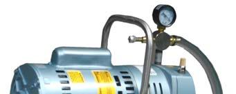 Assemble vacuum pump onto the vacuum tank by placing pump on top of the tank so the inlet and outlet ports of the pump
