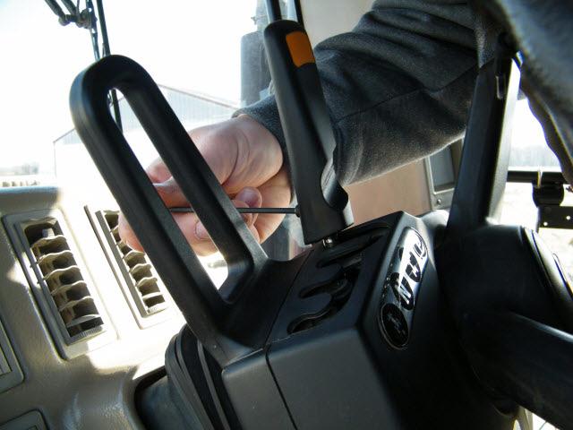 CNH Fit Kit Installation Procedure Install the Shift Lever Note: The lever comes with a spare set screw and a small metal sleeve. 1. Remove the old lever from the steering column. Keep the set screw.