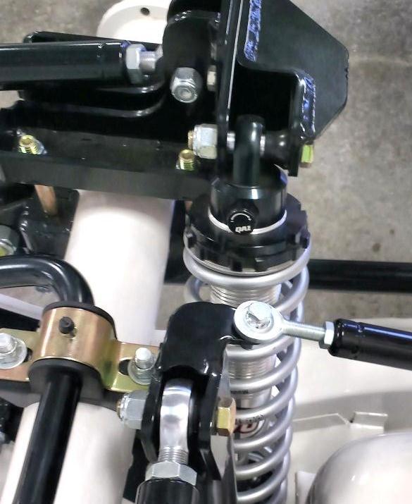 Install the high misalignment spacers (p/n 9004-167) into the front rod ends (Figure 21) in the front links and bolt the front links to the front mounting brackets using the ½ x 3 ¾ bolts (p/n