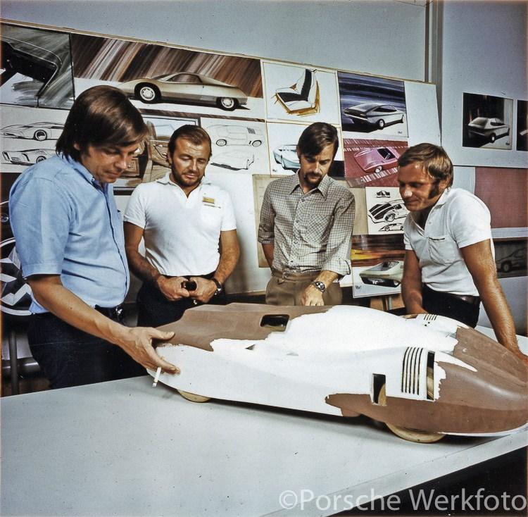 Chief Designer, Anatole Lapine (second from left) in the Design Dept. with colleagues and a Porsche model, ca.
