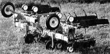 EASE OF OPERATION AND ADJUSTMENT Hitching: One person could hitch or unhitch the cultivator in about 5 minutes.