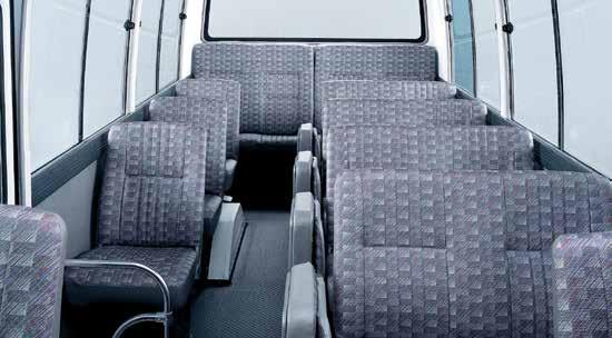 DX Low-back seating with vinyl upholstery.