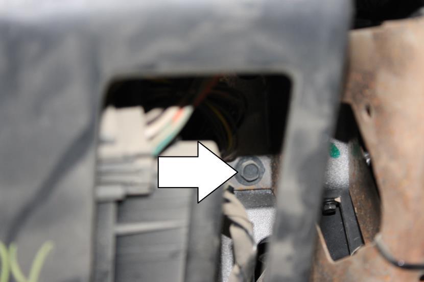 Suggested location is alongside the smaller wiring harness passing through the firewall, this is located towards the passenger side of the brake booster assembly.