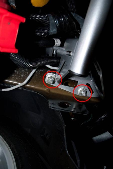 7. Install the Steeda Support and ensure the radiator bushings line up