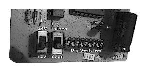 0 1. Install the receiver after the operator is programmed and the limits are set. 2. Remove the cover of the transmitter. Inside there are 9 dipswitches set in factory settings.